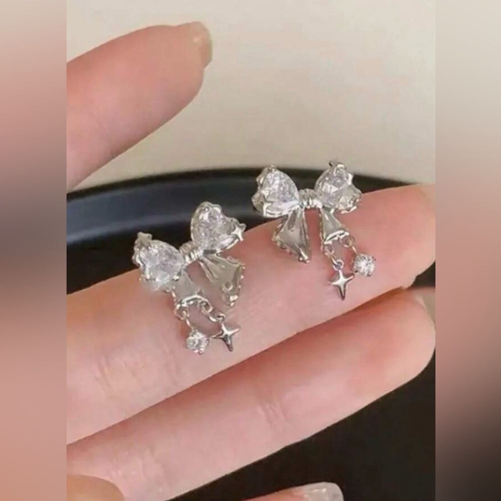 Zirconia bow with cross and crystal stud earrings - Picture 1 of 4